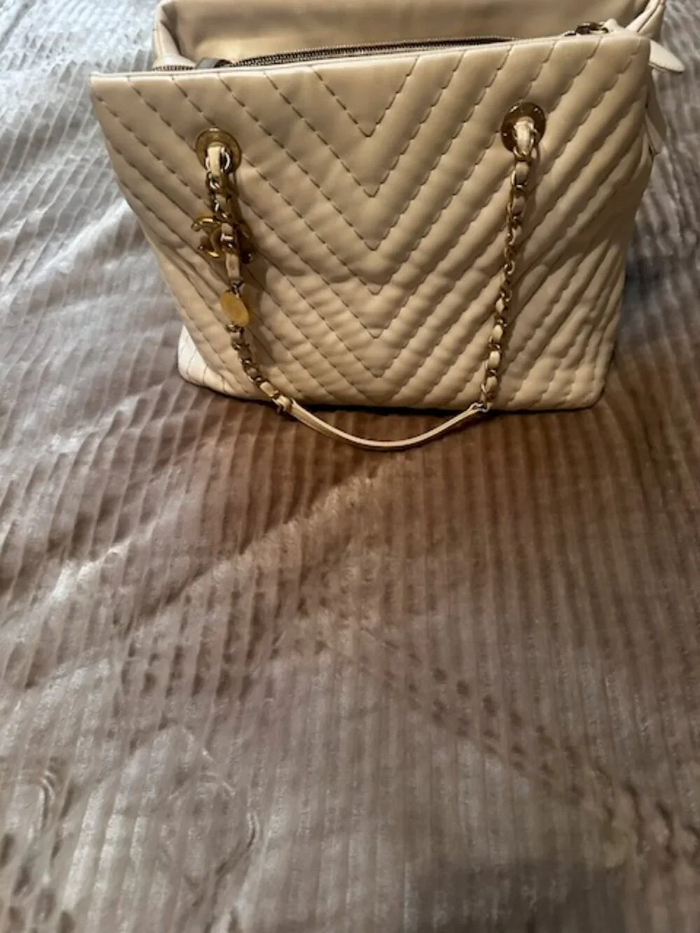 Chanel Surpique Chevron CC Charm Tote (often referred as Chevron V-Stitch Tote